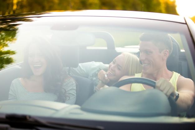 a_couple_driving_in_a_car