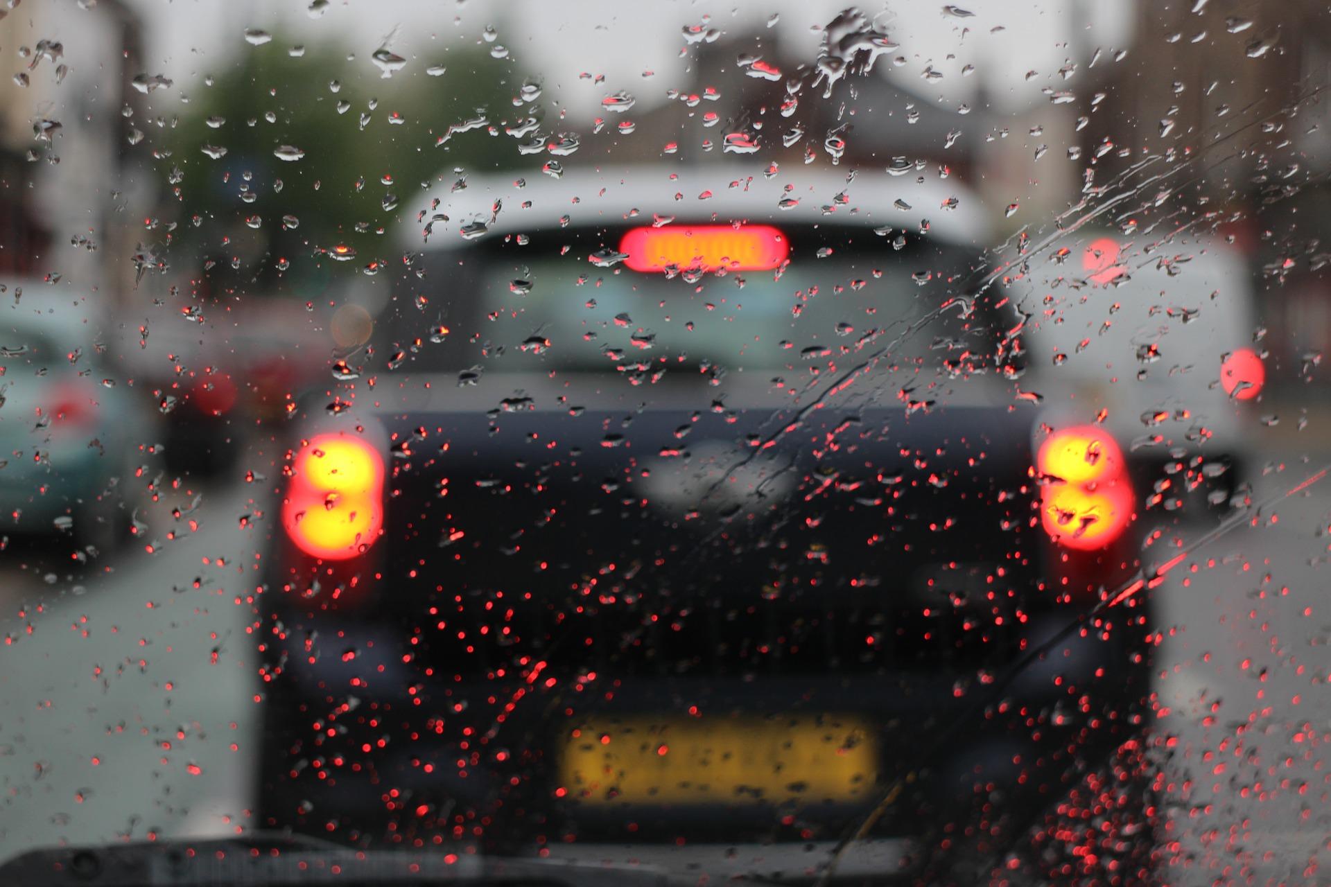 out_of_focus_rear_of_a_black_car