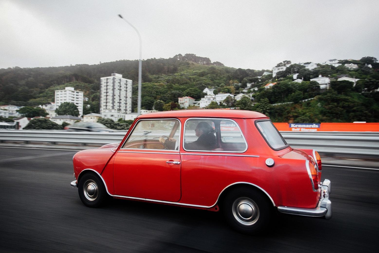 old_car_driving_on_a_motorway