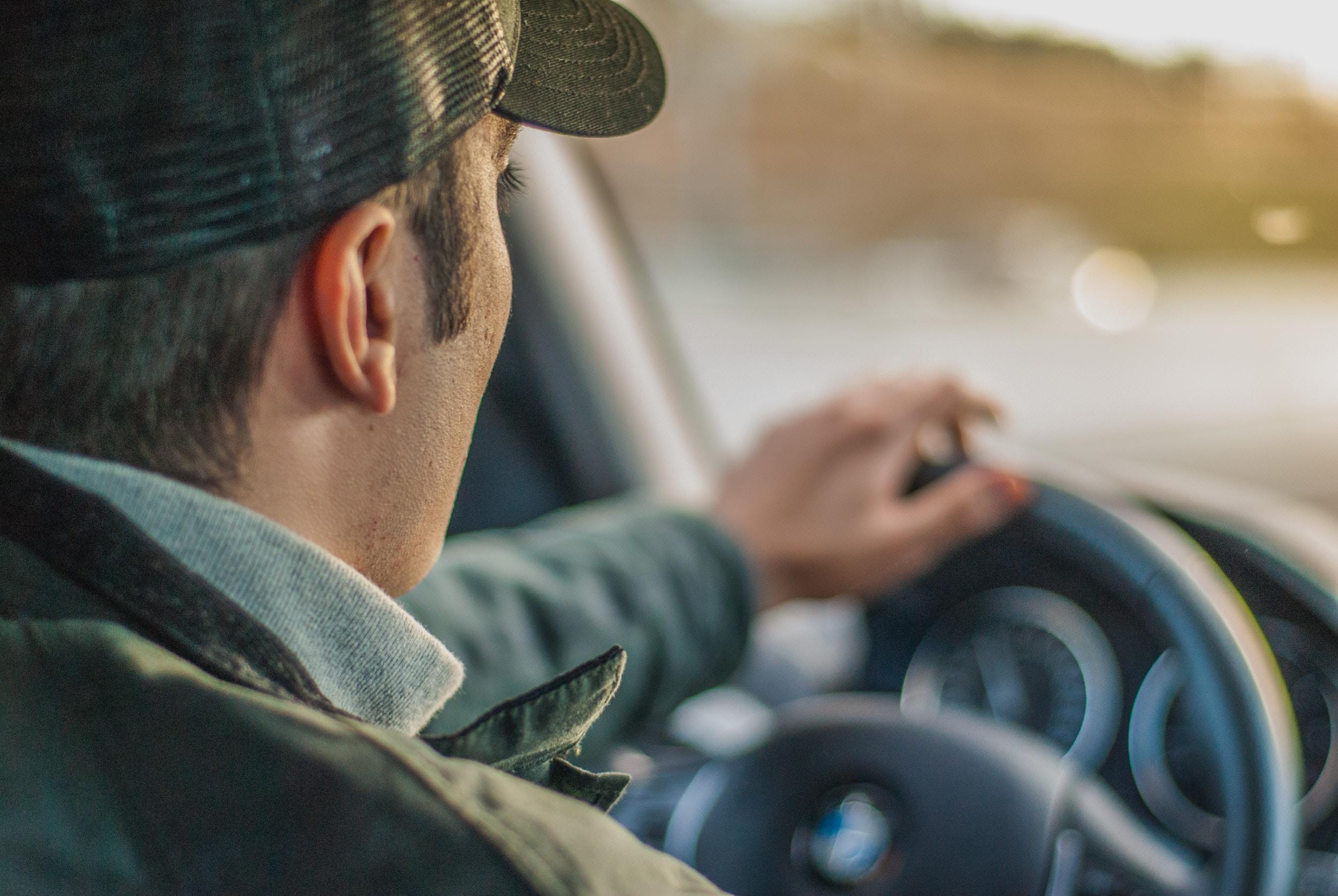 man_at_the_wheel_of_a_car