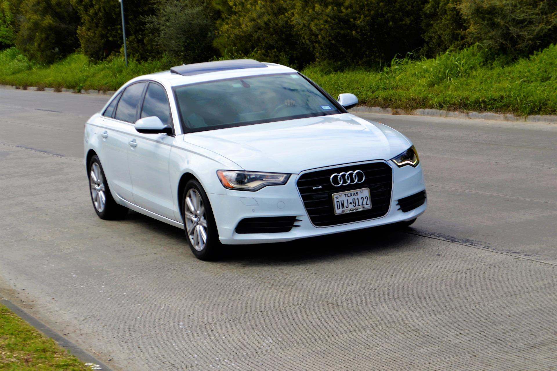 audi_driving_along_a_racetrack