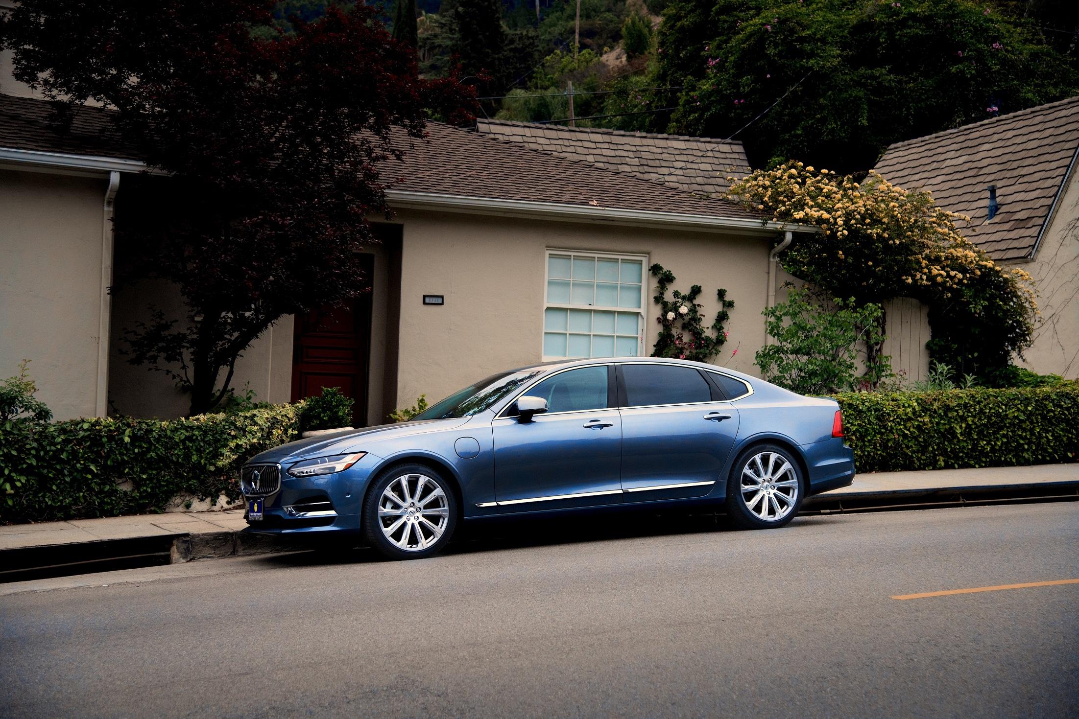 volvo_parked_outside_a_bungalow