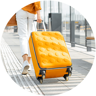 young female traveller with a luggage bag