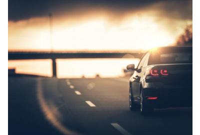 the-back-of-a-car-driving-down-a-motorway