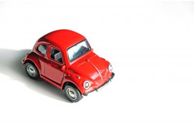 miniature_toy_vw_beetle_on_a_white_background