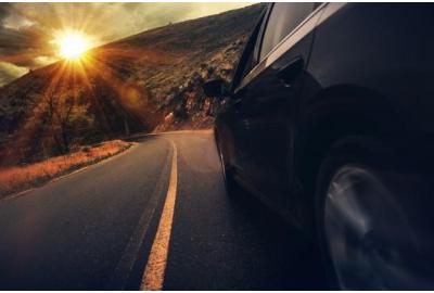 car_driving_down_a_windy_road