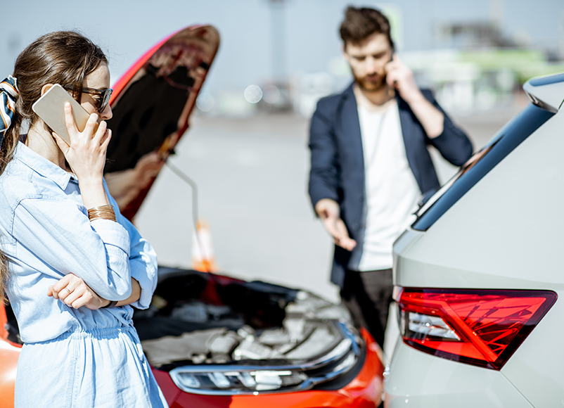 two drivers on phones after car accident