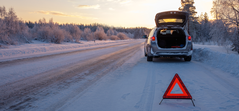 broken down on a snowy winter road