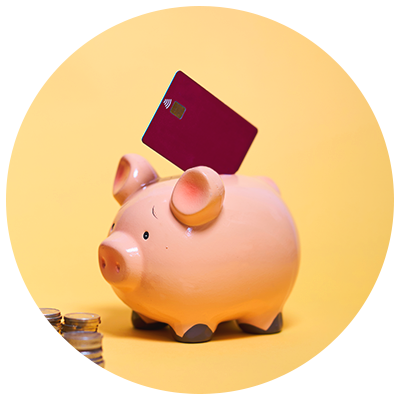 credit card on top of piggy bank